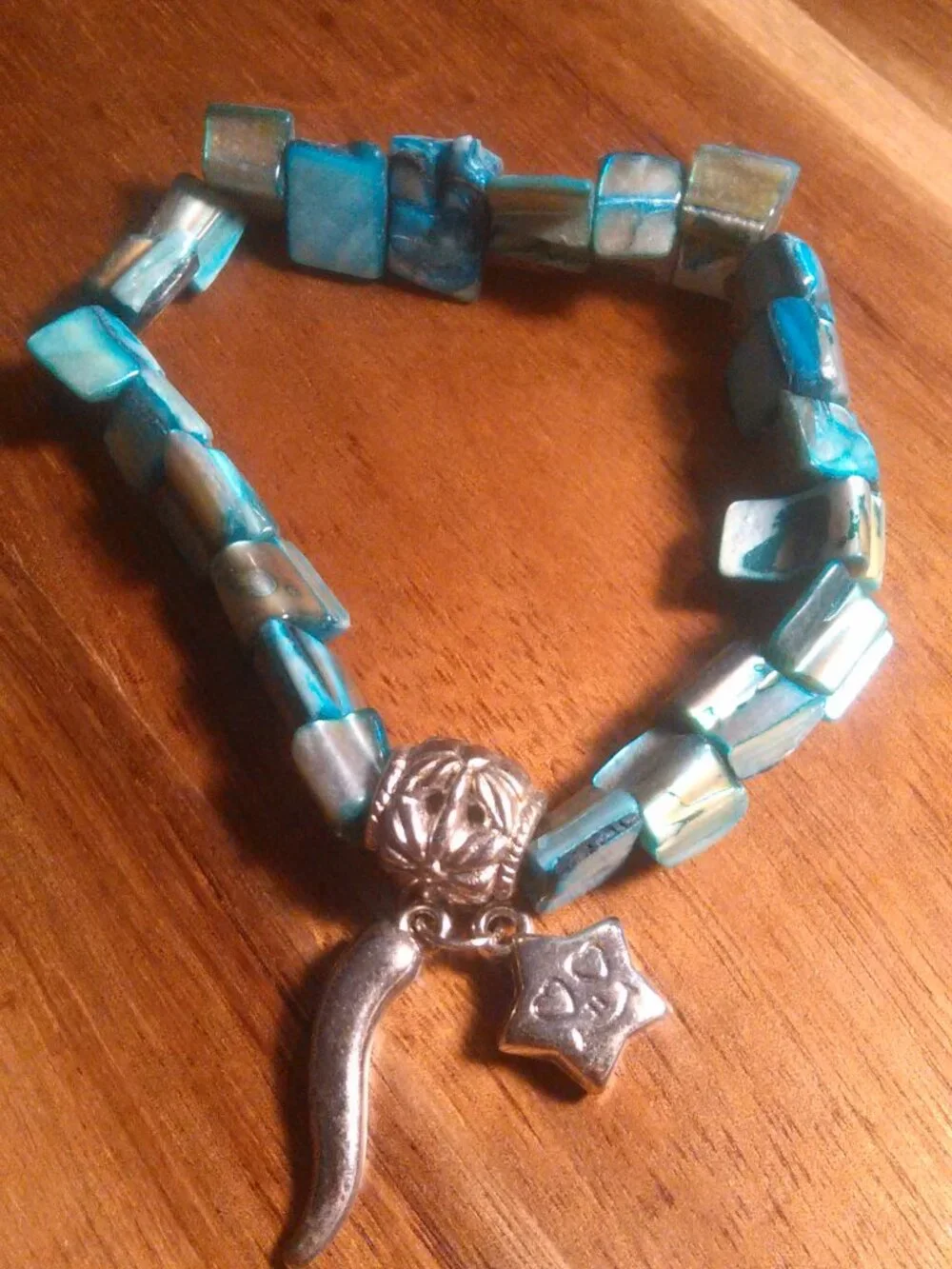 Blue Shell and Silvertone Star Charm Stretch Bracelet